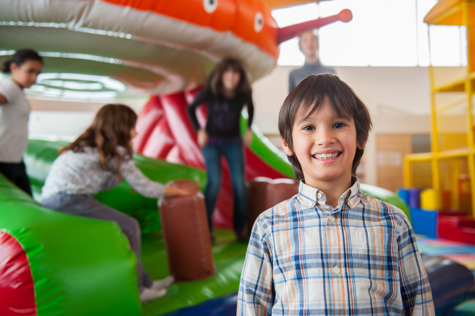 Kids playing on bounce house